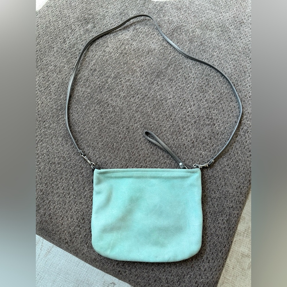 Compact Mint Crossbody Bag with Adjustable Black Strap